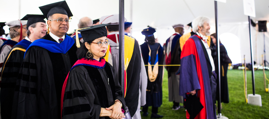 Photo of faculty lining up on Commencement day 2019