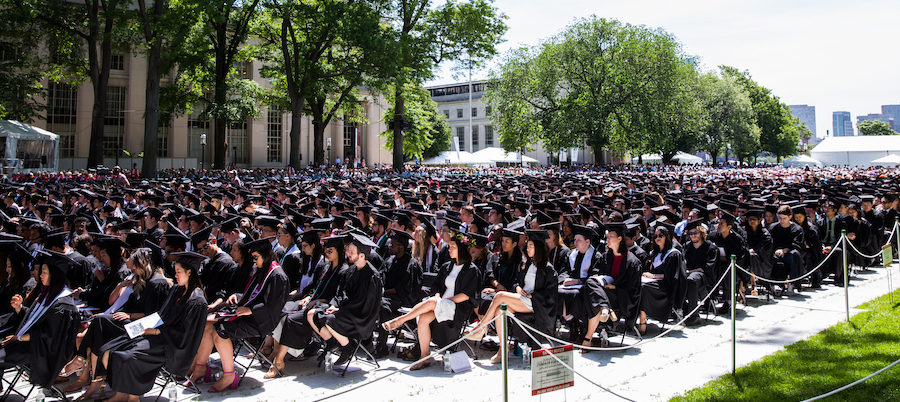 Image of graduates seated in Killian Court