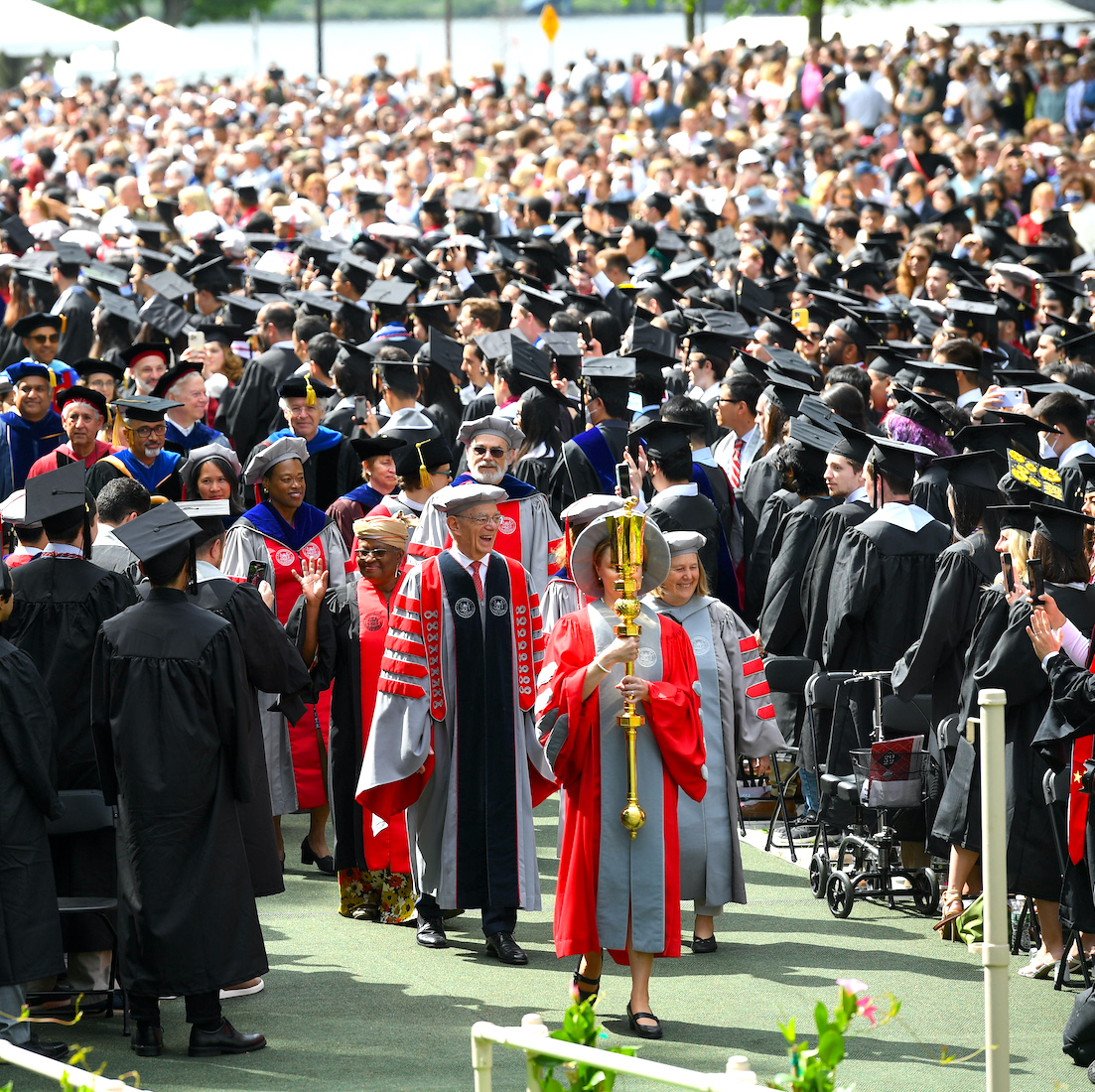 Image shows the academic procession arriving at Killian Court for the 2022 OneMIT Commencement Ceremony