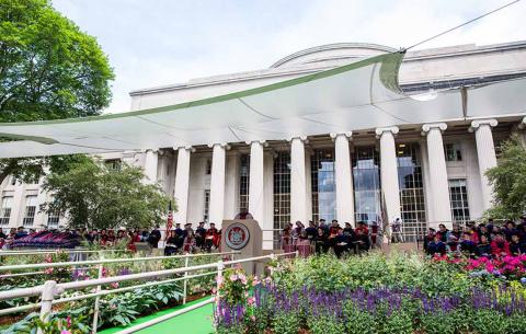 Wide shot of the ceremony stage with MIT's Great Dome in the background; photo: Jake Belcher