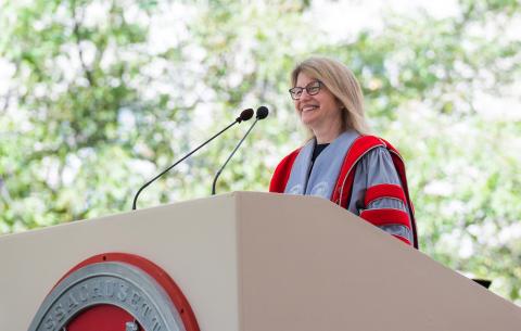 Image of President Sally Kornbluth speaking at the podium