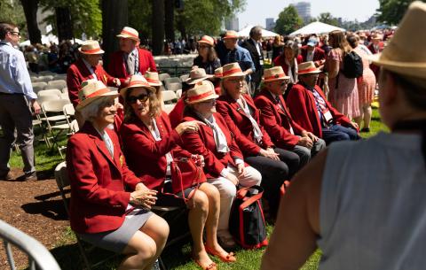 Image of female members of the Class of 1973, watching the academic procession.