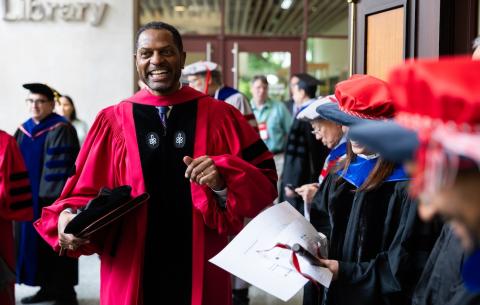 Image of Karl Reid in his regalia before the OneMIT Commencement Ceremony