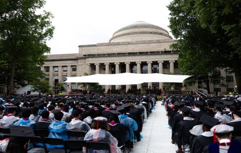 Image of Killian Court during the OneMIT Commencement Ceremony looking towards the Commencement stage