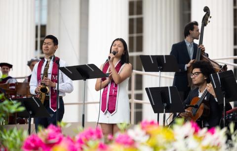 Image of student performers performing during the Undergraduate Ceremony
